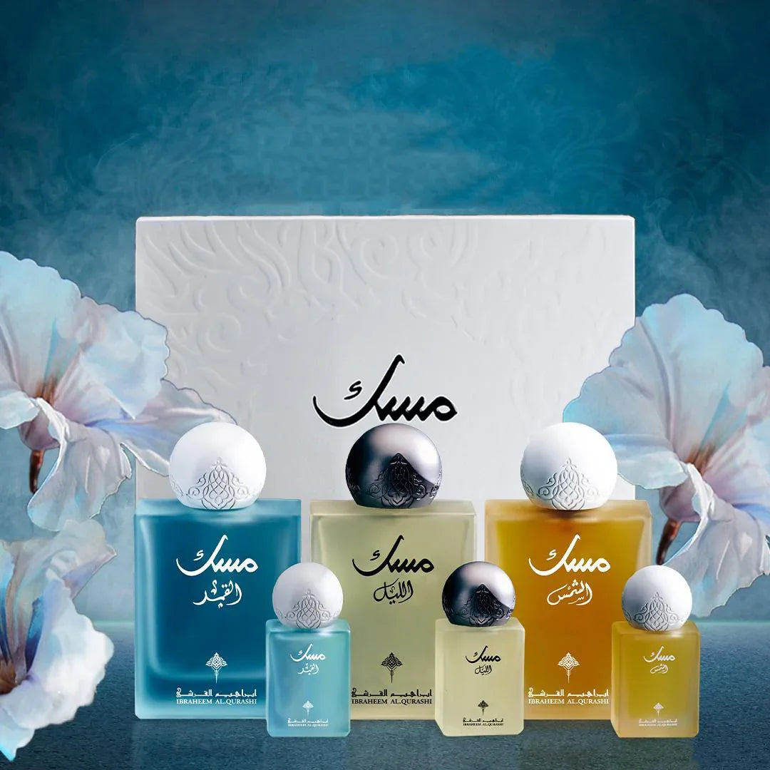 Luxury Middle Eastern perfumes with elegant bottles and floral accents for a refined fragrance experience.